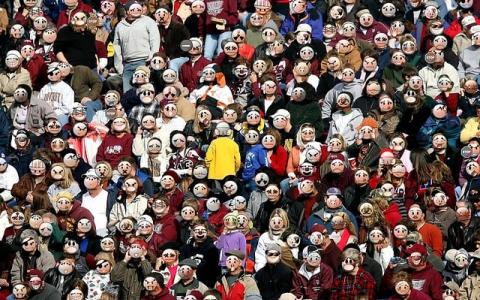 A large group of people with various cartoon faces