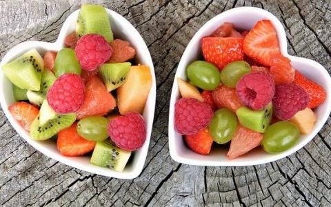 Two bowels of fruit in heart shaped containers