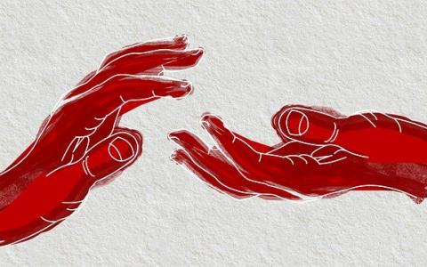 Two red open hands. One facing up and the other facing down. They are nearly touching each other
