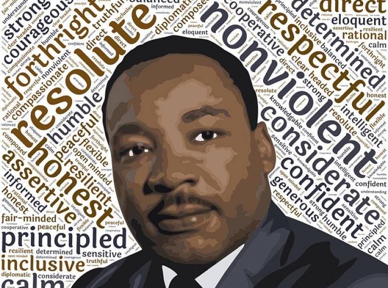 Rev. Dr. Martin Luther King portrait with key words behind such as nonviolent